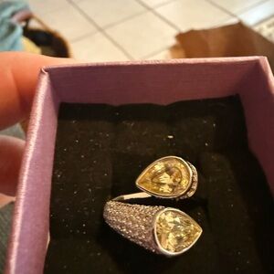 Dazzling Silver Ring with Yellow Gemstones